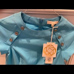 Etcetera blue sheath dress - Nail
Your next presentation!